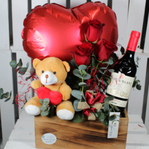 Caja rosas vino.